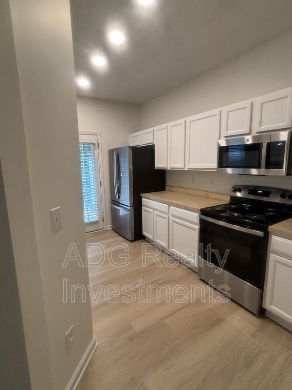 2128 Whispering Way - Photo 4 of 14