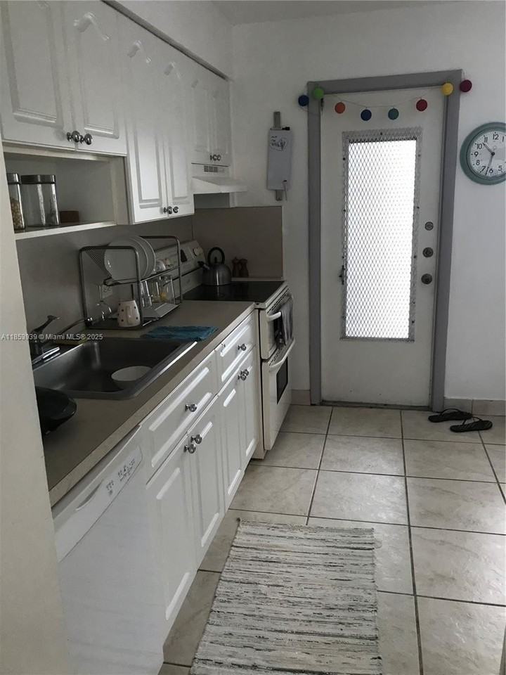 1075 93rd St #404 - Photo 3 of 15