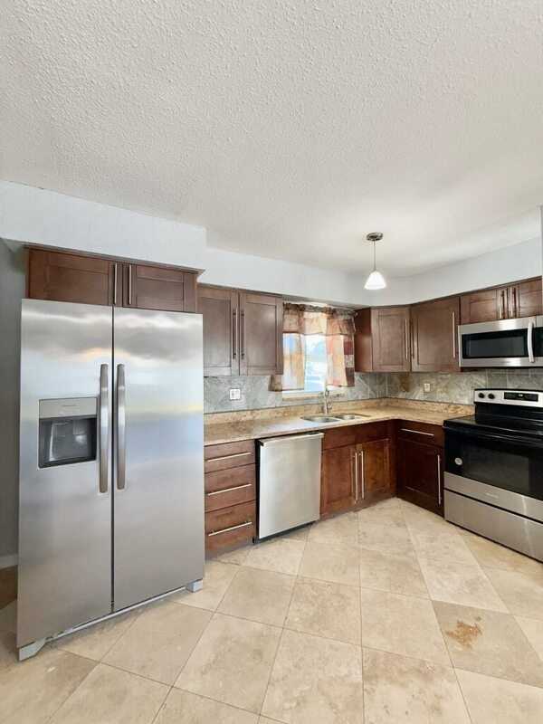 6943 Buhrley Ter N - Photo 6 of 50