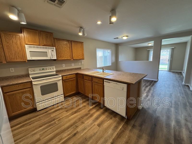 10153 N 115th Dr - Photo 2 of 15
