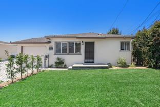 Your Private Yard & Garage Awaits—Only at 15301 Eastwood Ave - Photo 1 of 1
