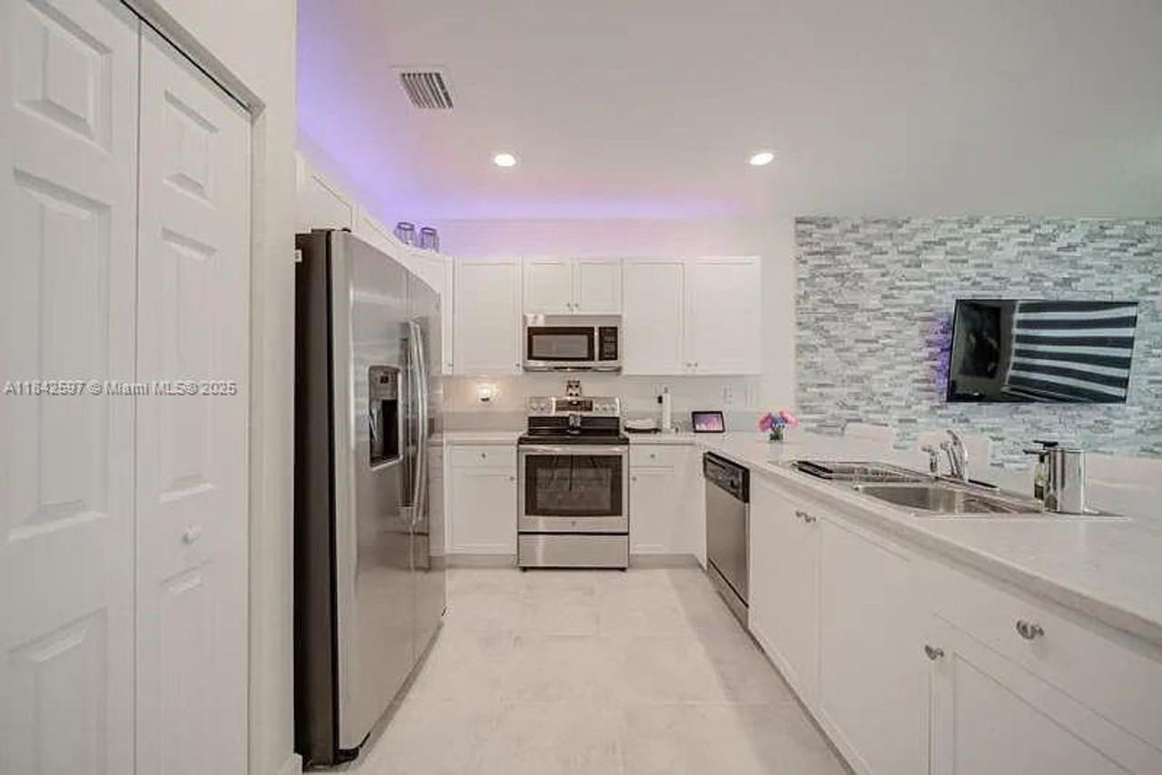 3371 W 106th Ter - Photo 2 of 20