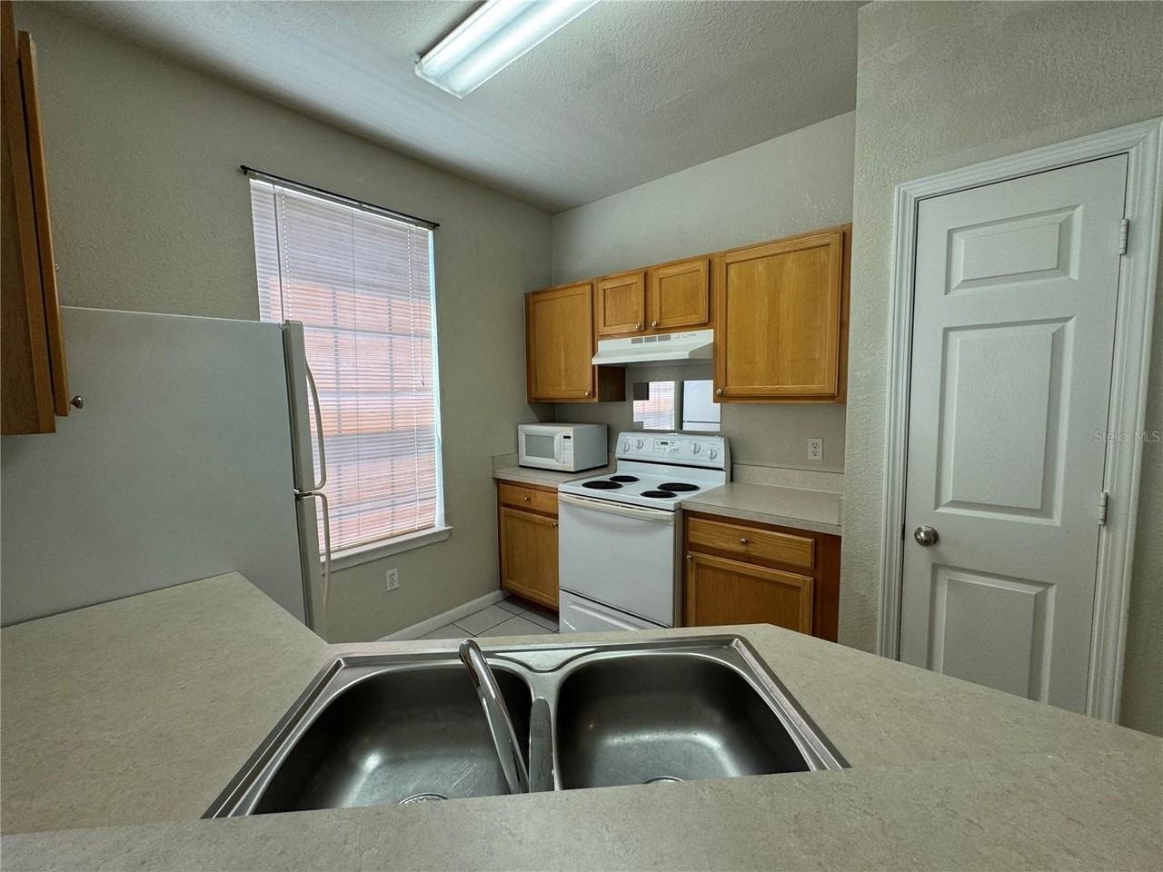 9157 Lee Vista Blvd #203 - Photo 2 of 9