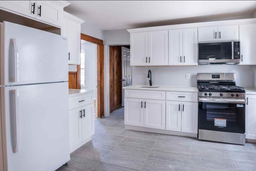 668 Grand St - Photo 3 of 3