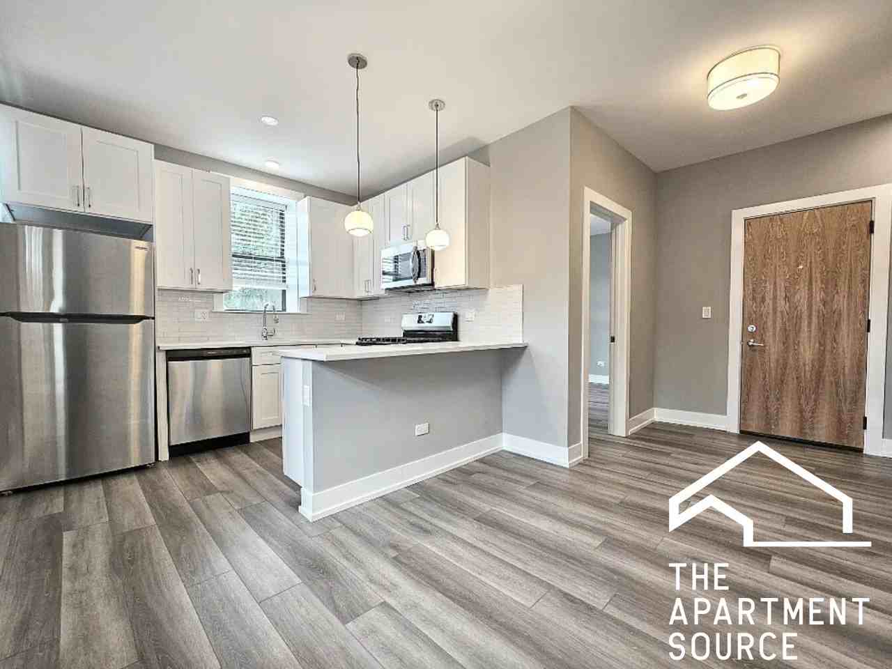 N Janssen Ave #E1 - Photo 2 of 9