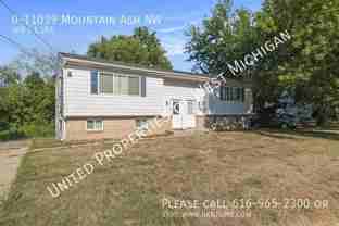 11039 Mountain Ash Ave Nw - Photo 1 of 1