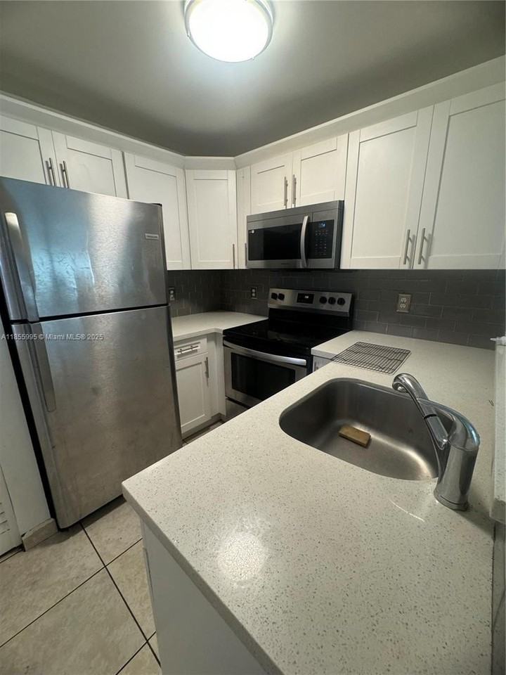 2705 W 64th Pl #52-14 - Photo 3 of 15