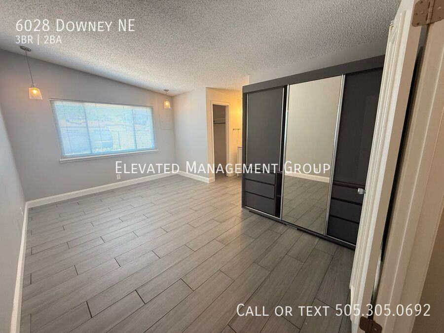 6028 Downey St Ne - Photo 3 of 32