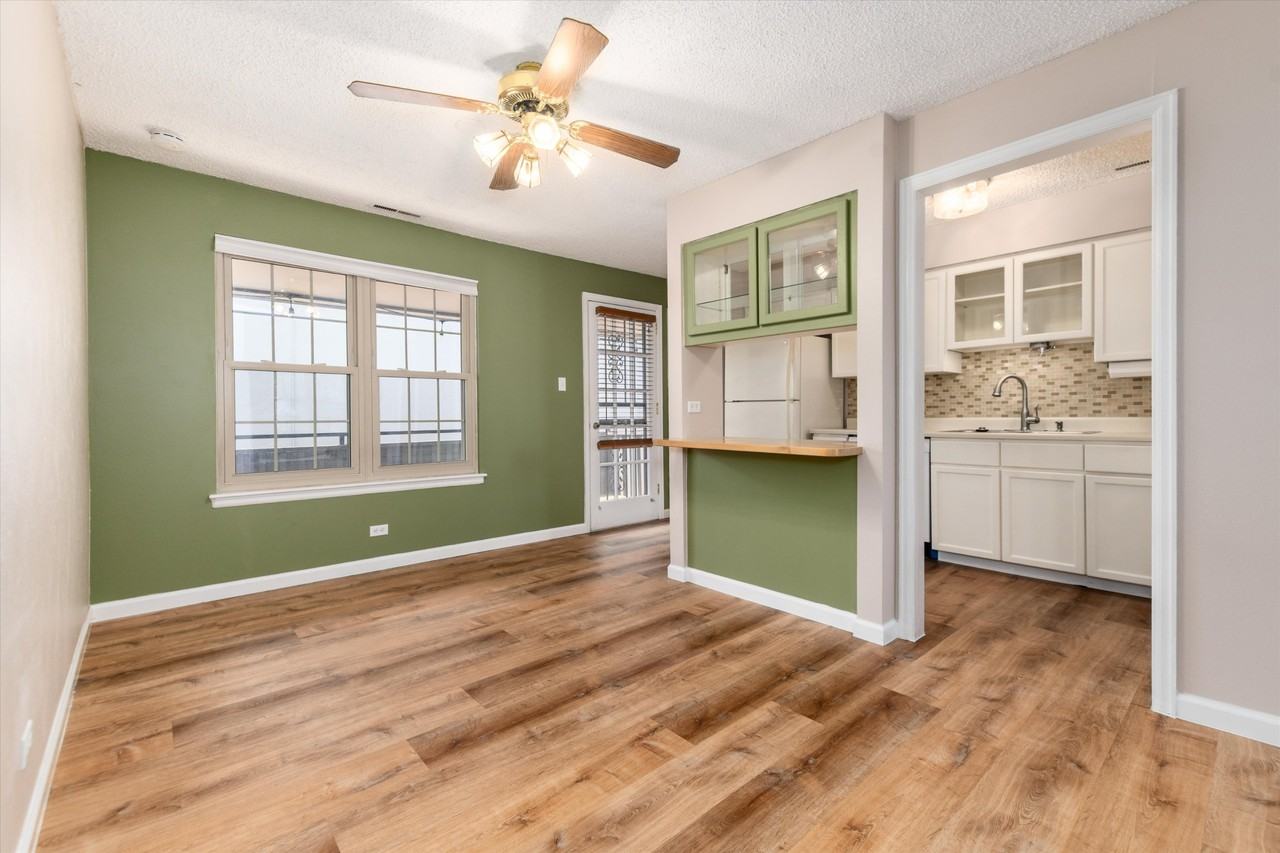 7105 S GAYLORD ST - Photo 3 of 29