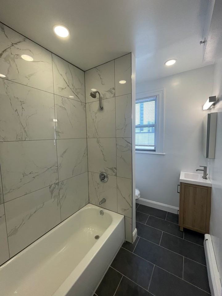 457 Centre St - Photo 4 of 16