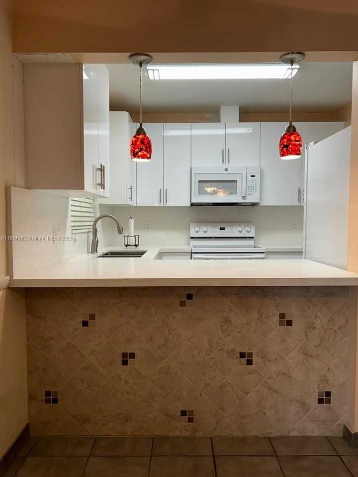 12282 Southwest 10th Street #3-10A1 - Photo 3 of 14