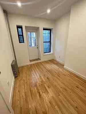 E 9th St #2A - Photo 2 of 8