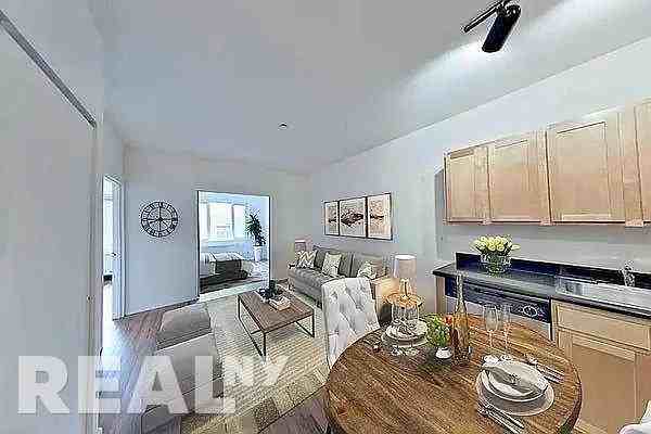 E 3rd St #PHD - Photo 2 of 7