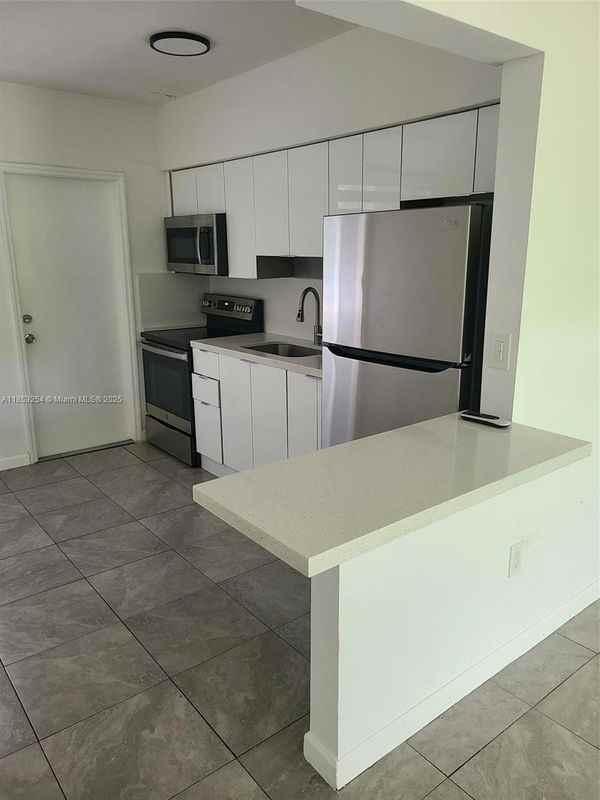 1365 Ne 111th St ##1 - Photo 2 of 3