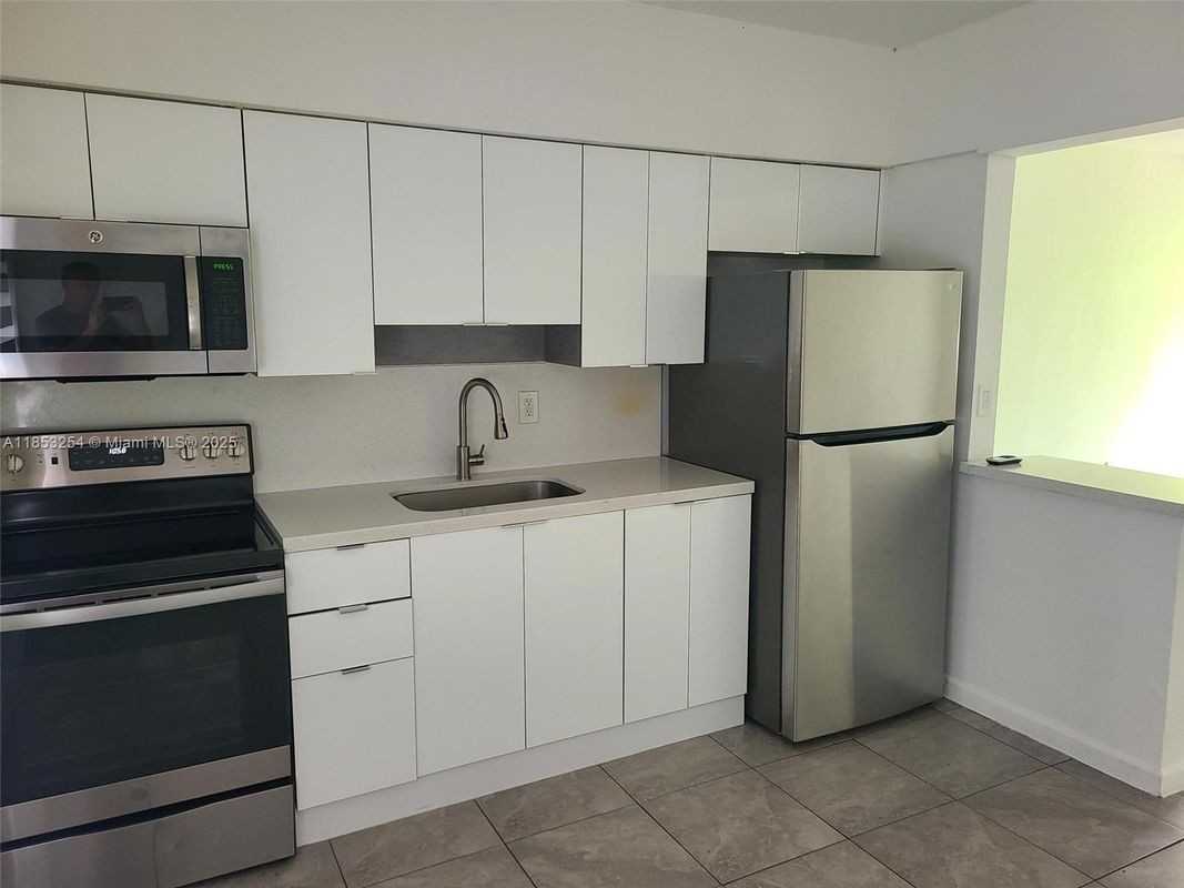 1365 Ne 111th St ##1 - Photo 3 of 3