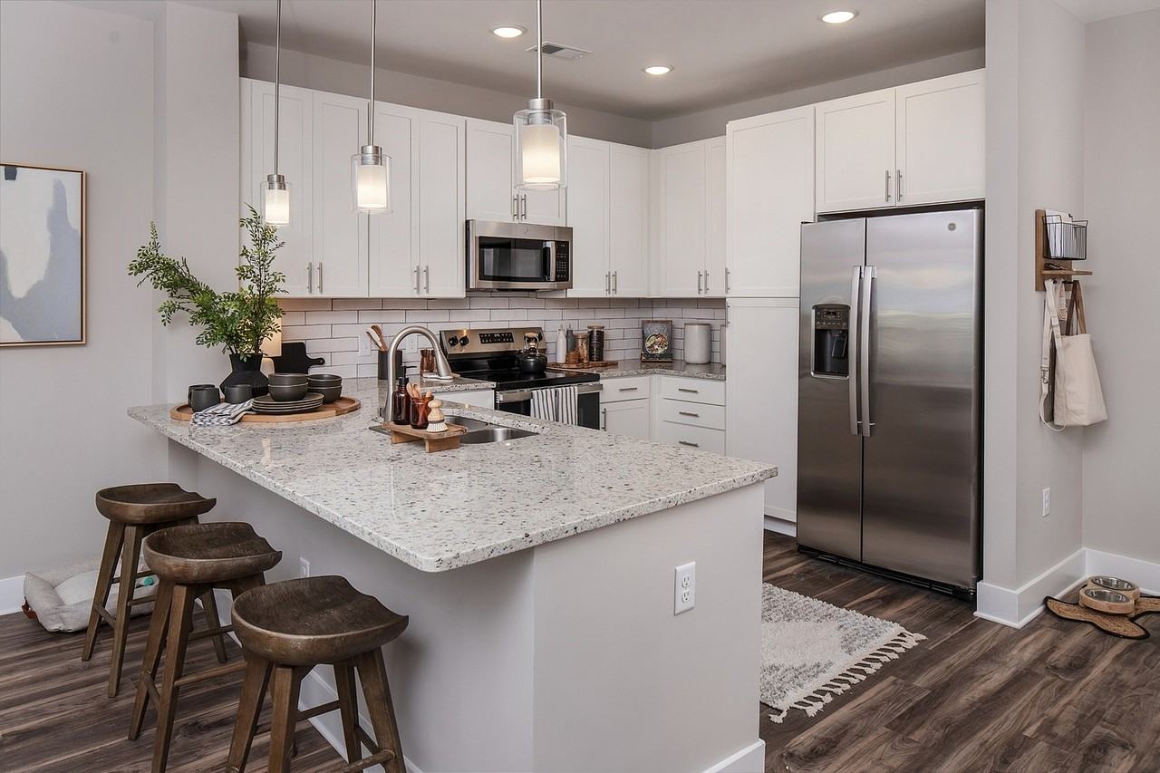 Abberly Alston Townhomes and - Photo 4 of 55