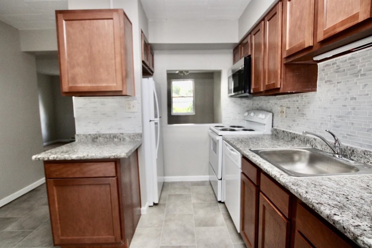 SYCAMORE APARTMENTS -- 130 - Photo 2 of 13