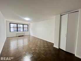 E 16th St #10F - Photo 1 of 1