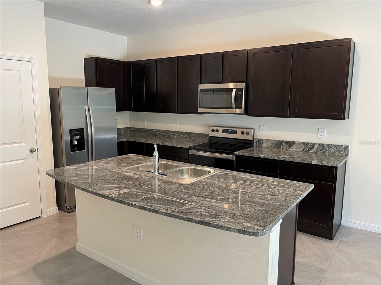 8708 Milestone Dr - Photo 5 of 37