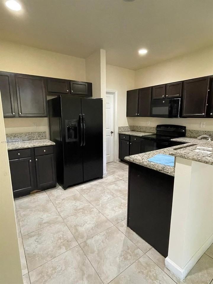 9143 Southwest 227th Terrace - Photo 7 of 20