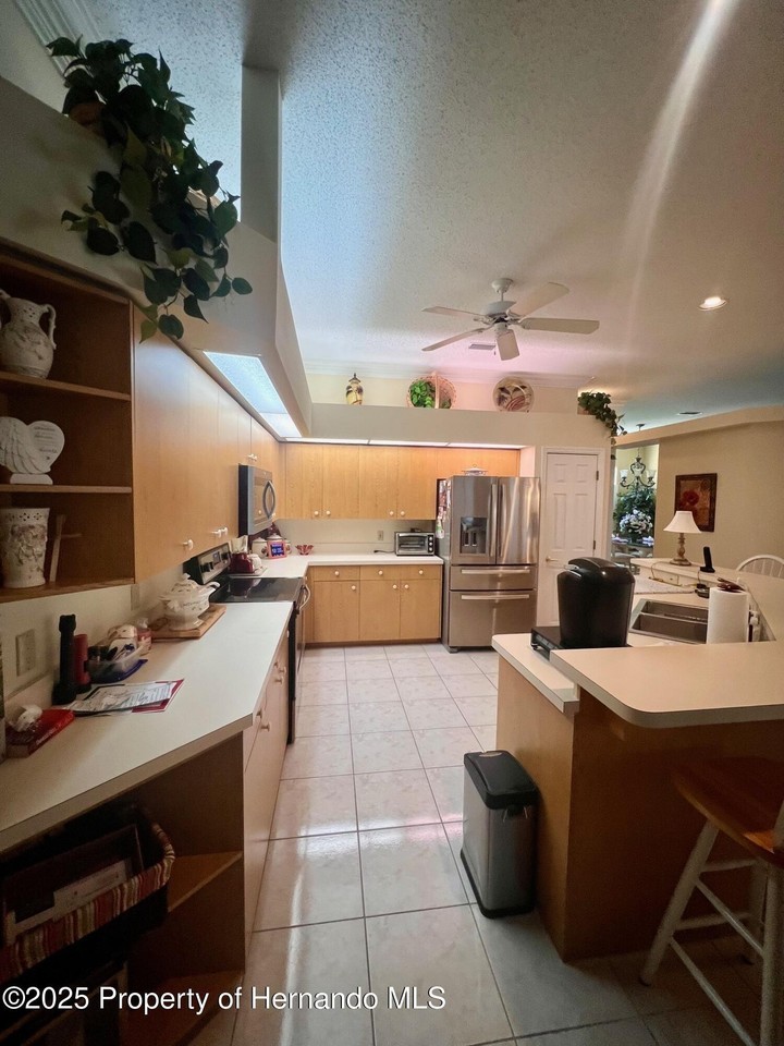 7424 Harvard Hills Pl - Photo 6 of 16