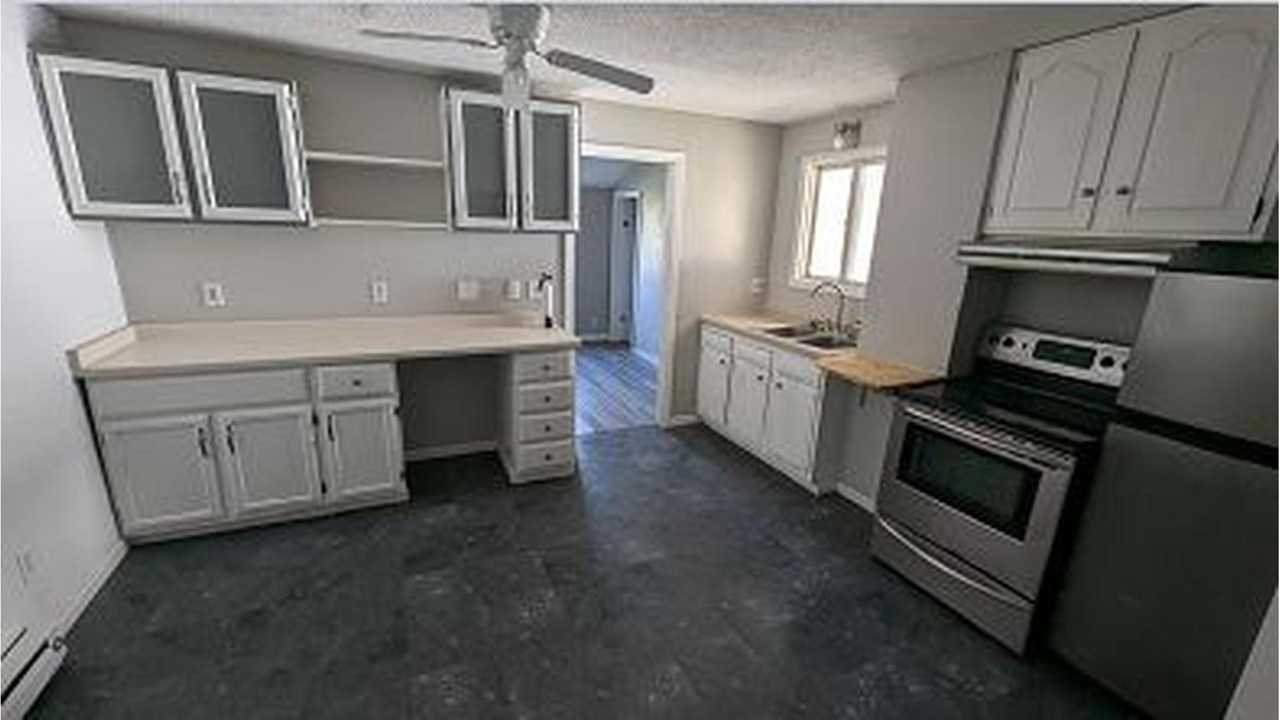 E 6th St - Photo 2 of 5