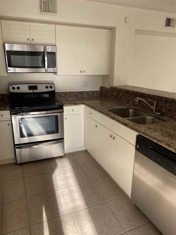 1749 Village Blvd ##106 - Photo 4 of 9