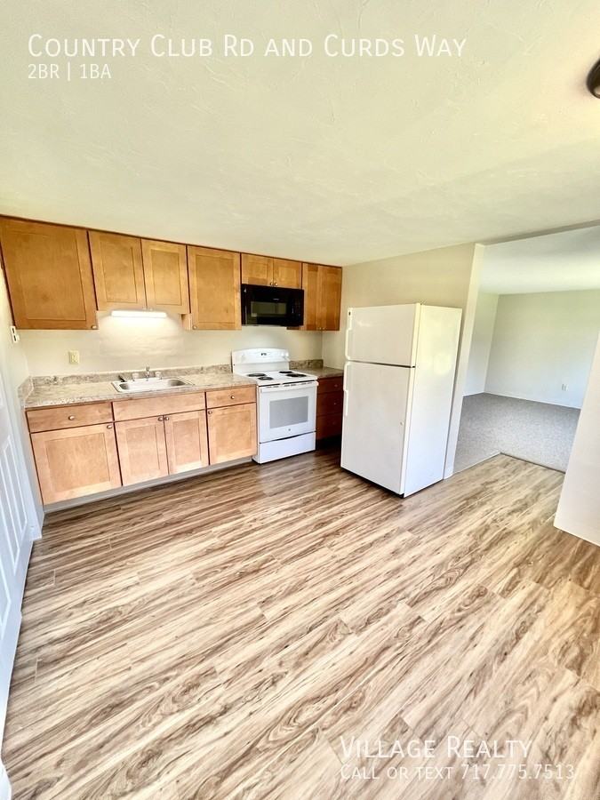 Country Club & Curds Way #F - Photo 2 of 50