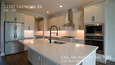 12182 Eastmoor Dr - Photo 2 of 50