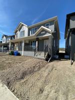 featured image of 107 Wolf Willow Blvd Se