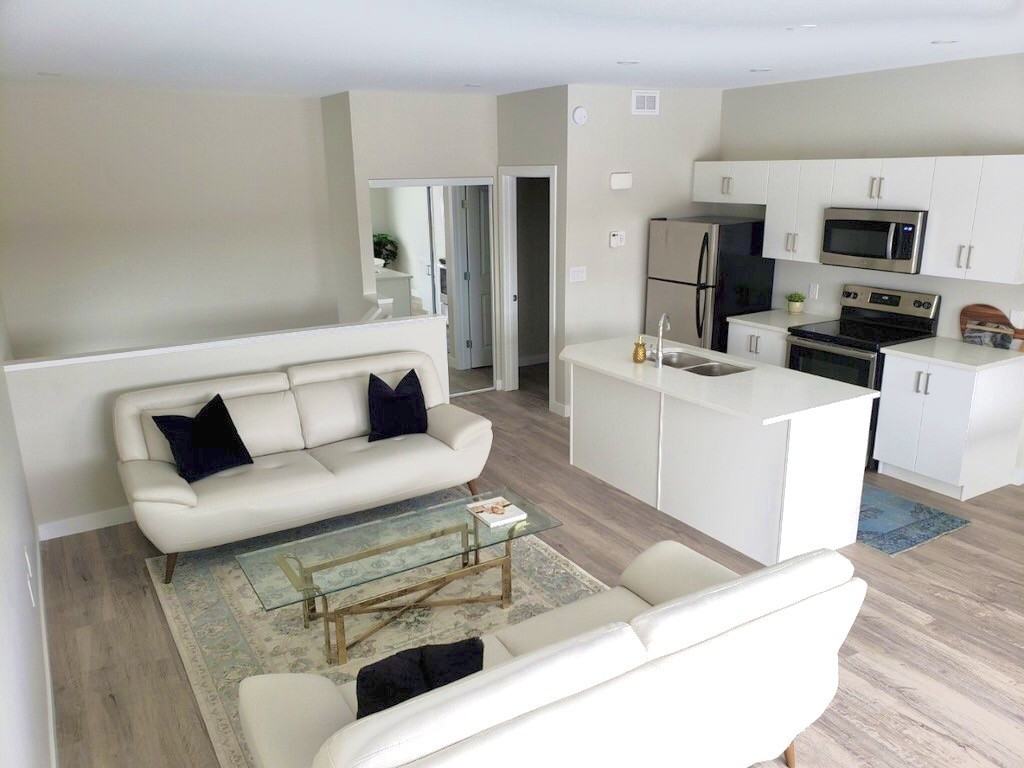 The Residences of 265 Marcoux - Photo 3 of 13