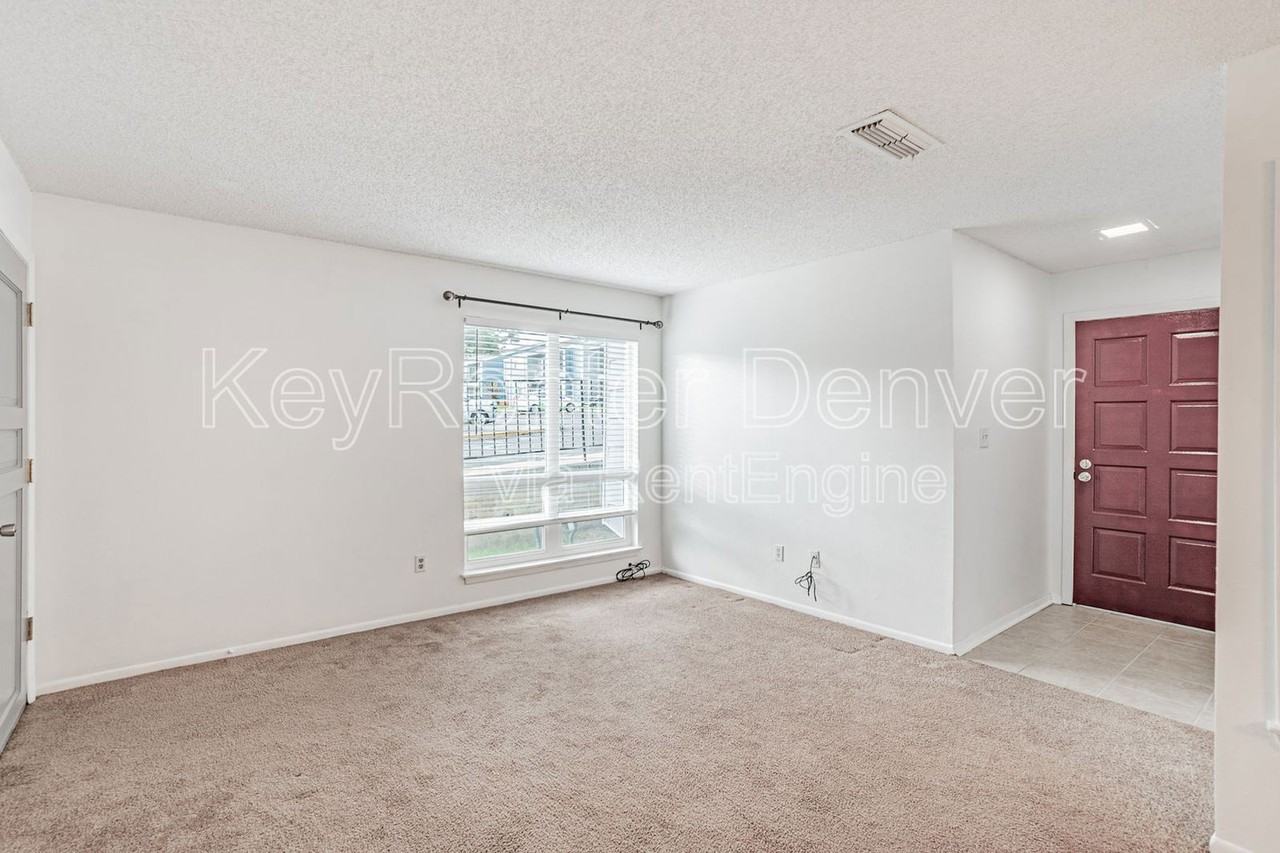 7185 S Gaylord St #E13 - Photo 2 of 36