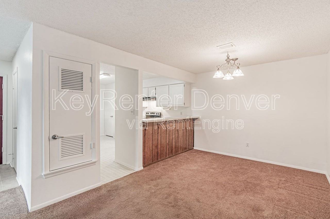 7185 S Gaylord St #E13 - Photo 4 of 36