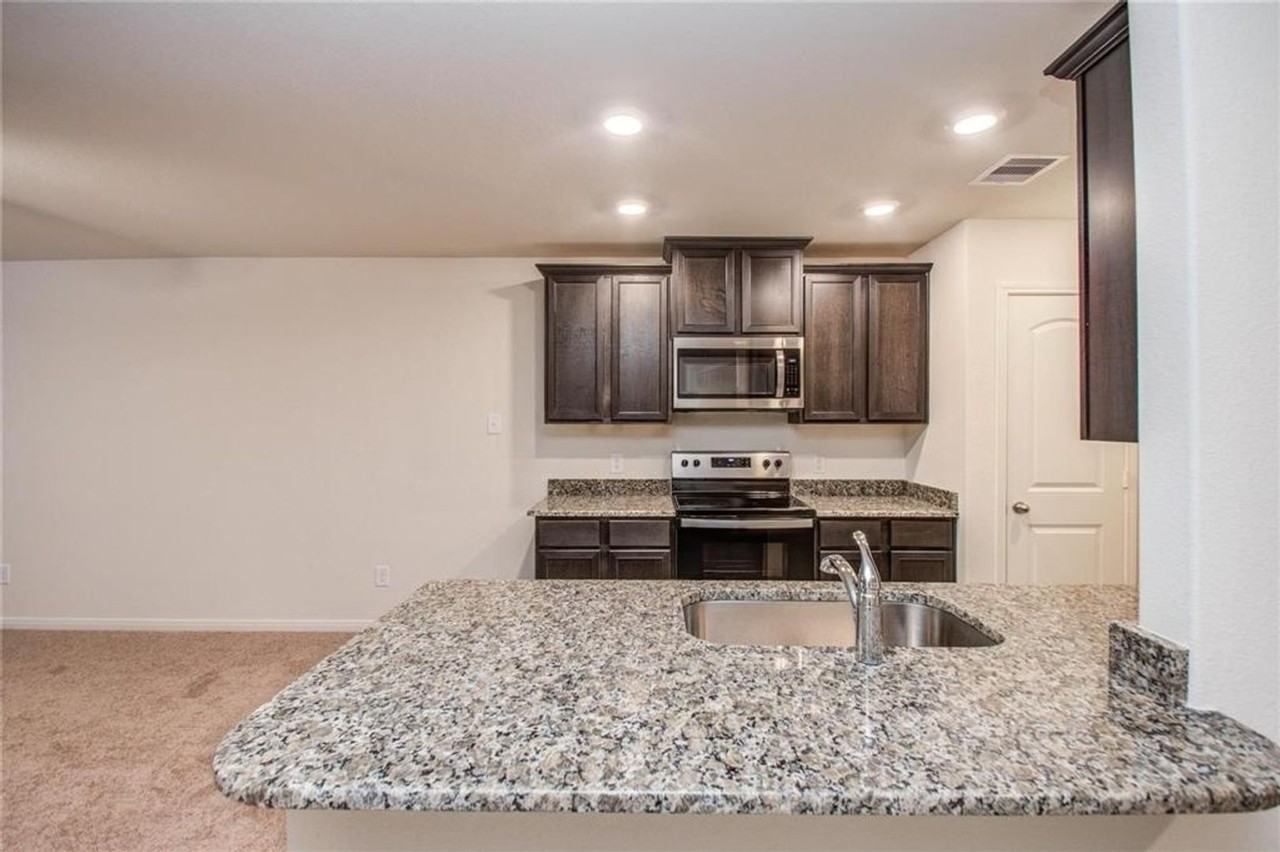 10699 Lost Maples Dr - Photo 4 of 36