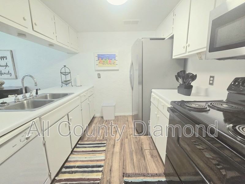 6903 N Lagoon Dr #6 - Photo 3 of 31