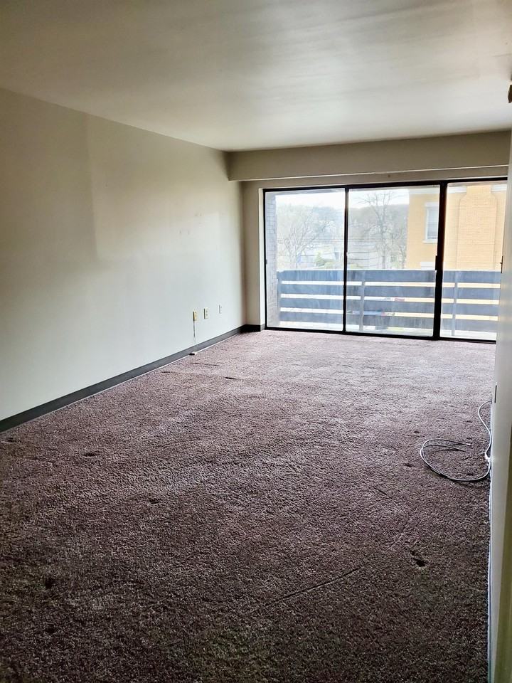 GREGORY APARTMENTS -- 102 - Photo 2 of 9