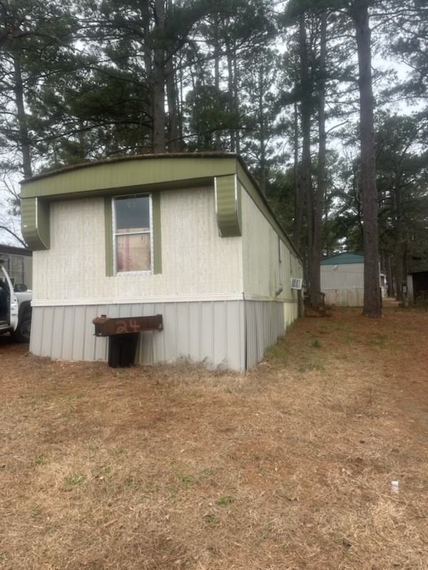 Whispering Pines Mobile Home - Photo 2 of 20