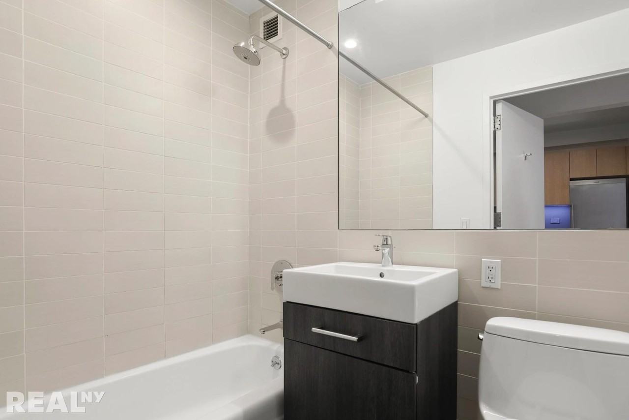 W 15th St #204 - Photo 4 of 4