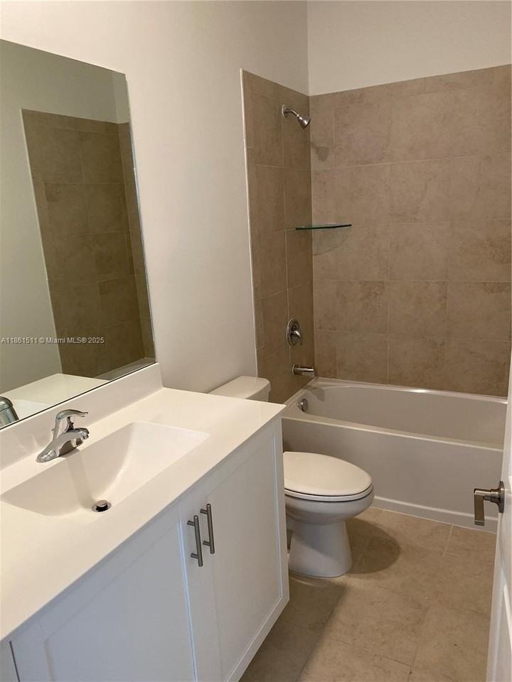 316 NE 208th Ter - Photo 3 of 25