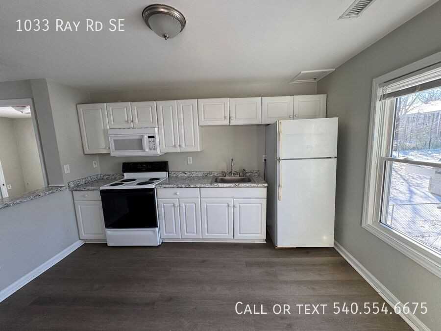 1033 Ray Rd Se - Photo 2 of 4