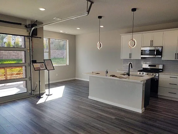 10594 W 63rd Ln - Photo 2 of 10