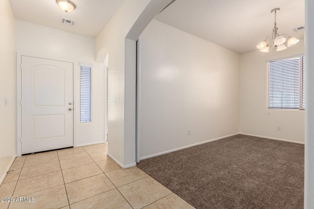 9883 W Harmony Ln - Photo 5 of 30