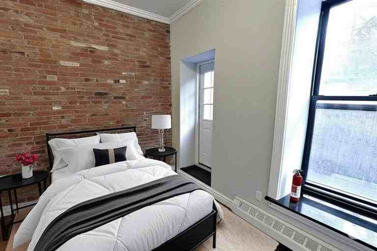 E 28th St #1B - Photo 2 of 5