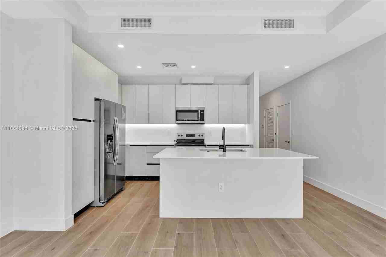 1563 Nw 94th Way - Photo 3 of 14