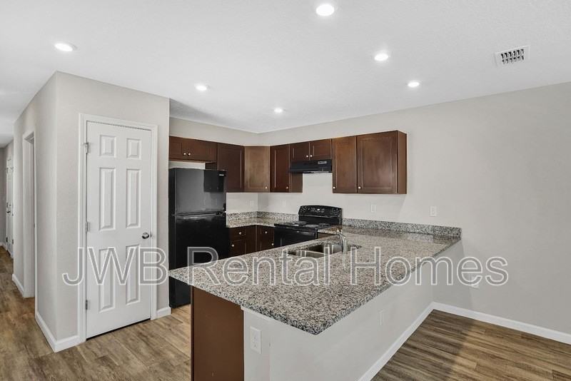 9820 Morgan Marsh Ct - Photo 2 of 13