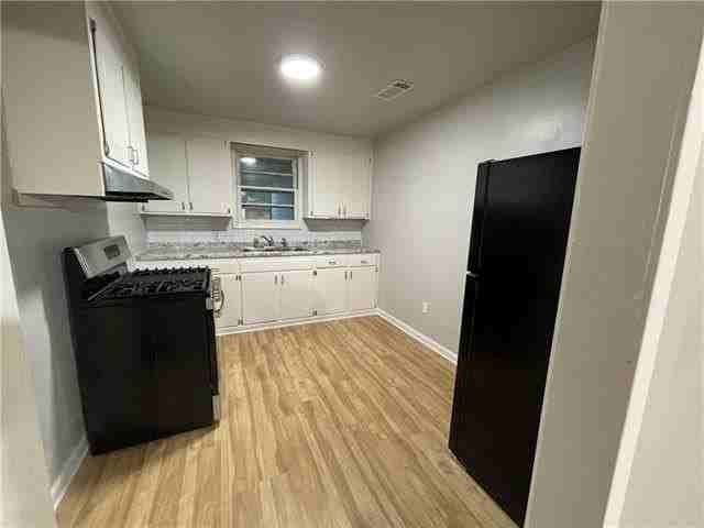 208 N Scanlan St - Photo 6 of 15