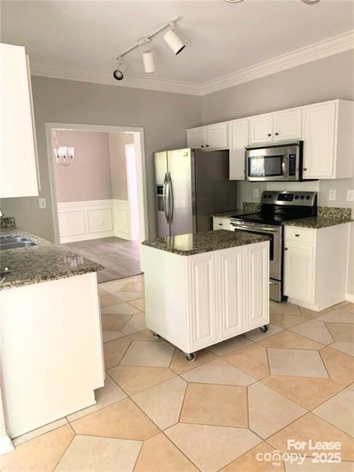 7010 Duchamp Dr - Photo 2 of 8