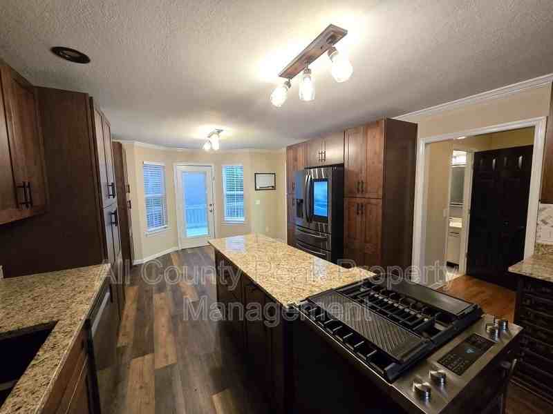 8616 River Cove Dr - Photo 3 of 26