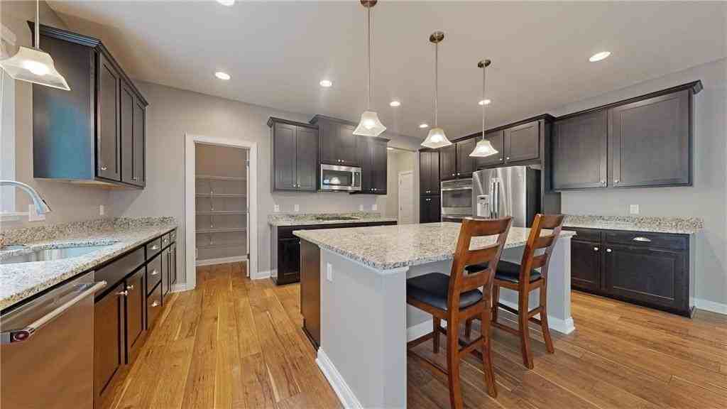 5585 Orchard Curve - Photo 3 of 42