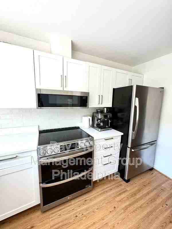 834 N Newkirk St - Photo 6 of 30